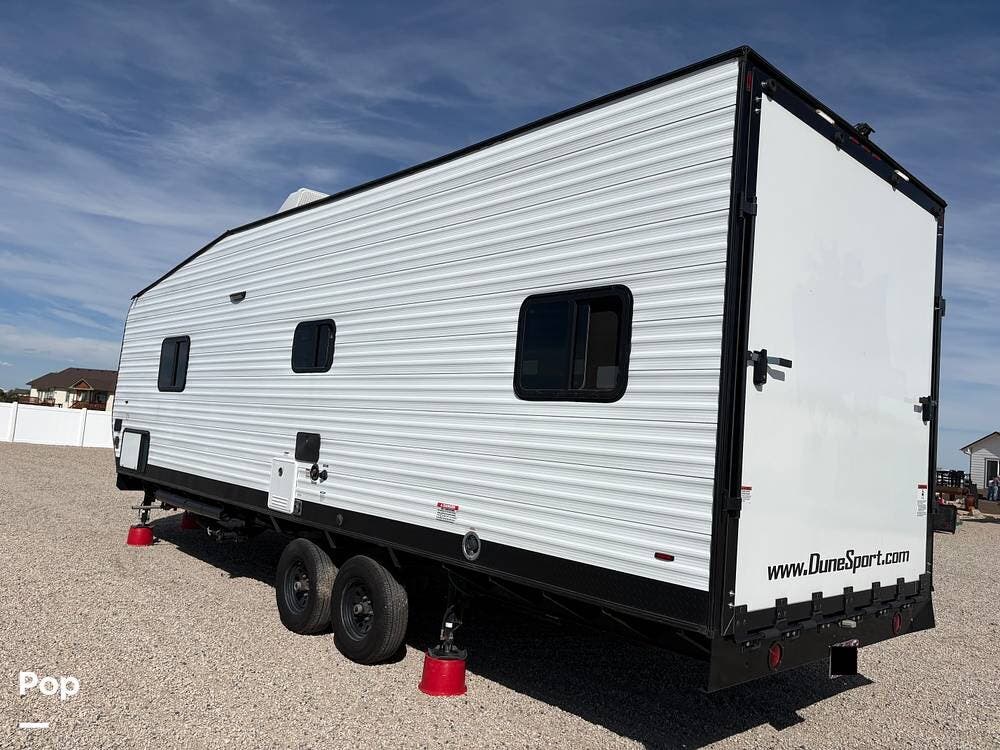 Call now about this 2023 Miscellaneous Dynamite Mfg Man Cave RV Dune FBX26! 2023 Miscellaneous Dynamite Mfg Man Cave RV Dune FBX26 - Used Toy Hauler For Sale by Pop RVs in Keenesburg, Colorado features Leveling Jacks, Awning, Generator, Air Conditioning