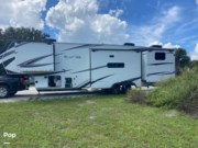 Call now about this 2023 Grand Design Solitude 3740BH-R! 2023 Grand Design Solitude 3740BH-R - Used Fifth Wheel For Sale by Pop RVs in Stuart, Florida features Slideout, Leveling Jacks, Awning, Air Conditioning