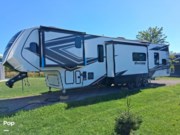 Call now about this 2023 Grand Design Momentum 395MS! 2023 Grand Design Momentum 395MS - Used Toy Hauler For Sale by Pop RVs in Mayville, Michigan features Generator, Awning, Leveling Jacks, Air Conditioning, Slideout