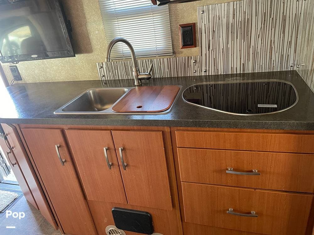 Contact us now about this 2012 Winnebago Navion Itasca 24M! 2012 Navion Itasca 24M by Winnebago from Pop RVs in Los Lunas, New Mexico