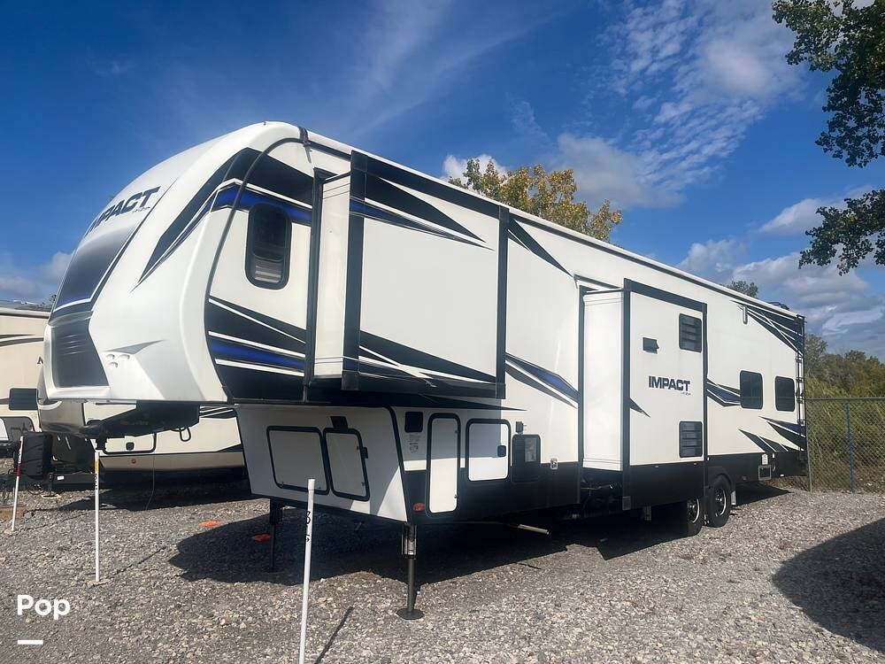 Call now about this 2020 Keystone Impact 367! 2020 Keystone Impact 367 - Used Toy Hauler For Sale by Pop RVs in West Seneca, New York features Air Conditioning, Leveling Jacks, Generator, Awning, Slideout