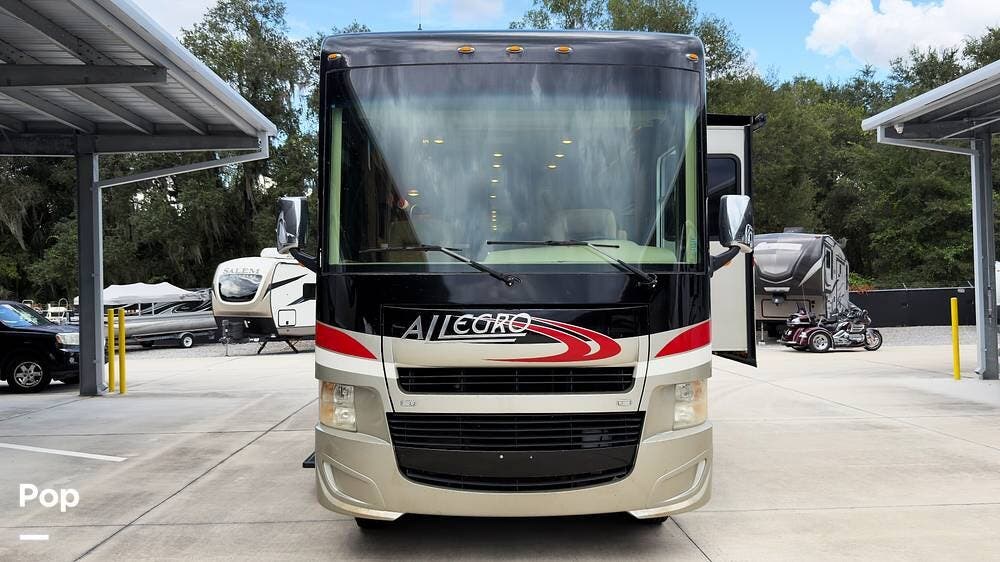 Call now about this 2015 Tiffin Allegro Open Road 31SA! 2015 Tiffin Allegro Open Road 31SA - Used Class A For Sale by Pop RVs in The Villages, Florida features Generator, Air Conditioning, Slideout, Awning, Leveling Jacks