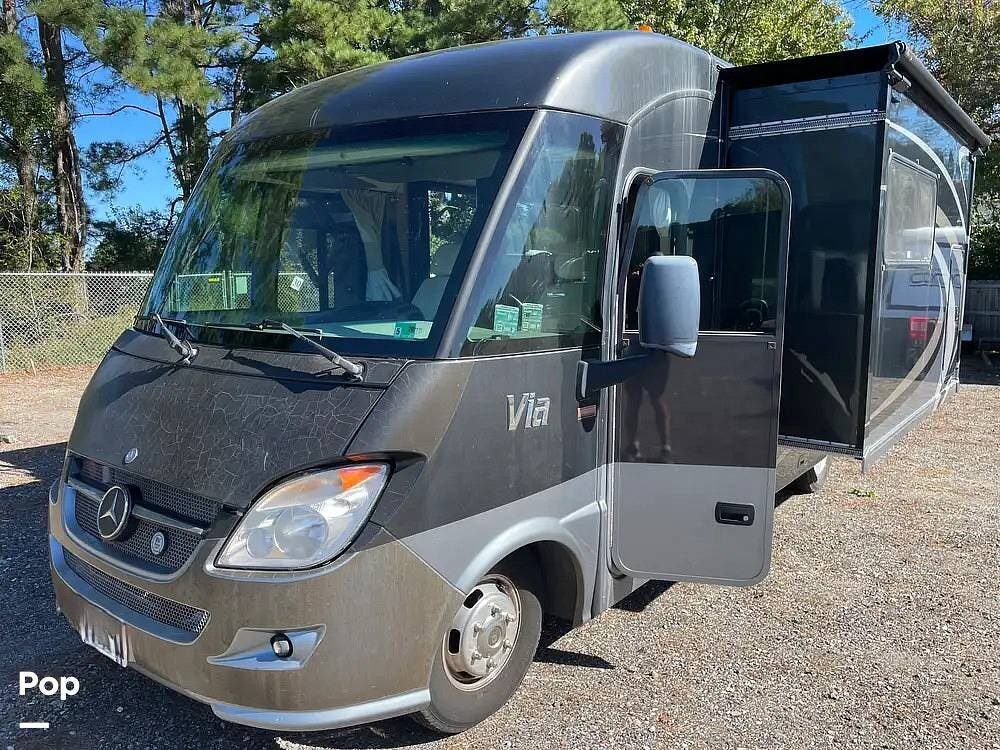 Call now about this 2014 Winnebago Via 25P! 2014 Winnebago Via 25P - Used Diesel Pusher For Sale by Pop RVs in Virginia Beach, Virginia features Air Conditioning, Awning, Slideout, Generator, Leveling Jacks