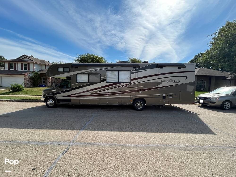 Call now about this 2013 Coachmen Leprechaun 319DS! 2013 Coachmen Leprechaun 319DS - Used Class C For Sale by Pop RVs in Fort Worth, Texas features Slideout, Generator, Air Conditioning, Leveling Jacks