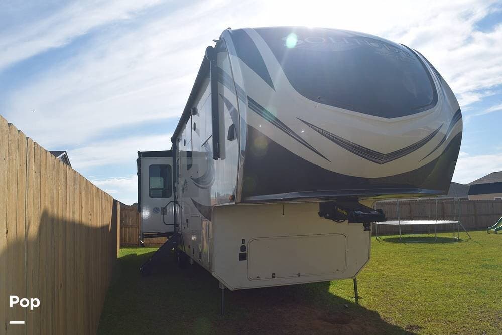 Call now about this 2020 Grand Design Solitude 377MBS! 2020 Grand Design Solitude 377MBS - Used Fifth Wheel For Sale by Pop RVs in Milton, Florida features Awning, Leveling Jacks, Slideout, Air Conditioning