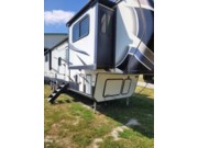 Call now about this 2021 Keystone Montana High Country 383TH! 2021 Keystone Montana High Country 383TH - Used Toy Hauler For Sale by Pop RVs in El Paso, Illinois features Air Conditioning, Leveling Jacks, Awning, Slideout