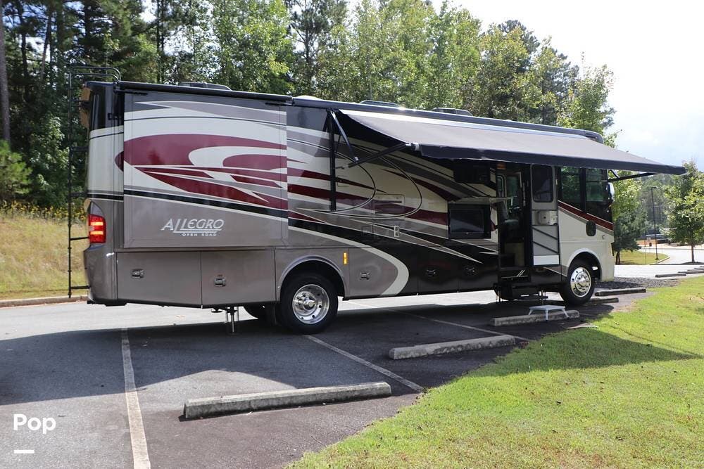 Call now about this 2015 Tiffin Allegro Open Road 32CA! 2015 Tiffin Allegro Open Road 32CA - Used Class A For Sale by Pop RVs in Woodstock, Georgia features Slideout, Air Conditioning, Awning, Generator, Leveling Jacks