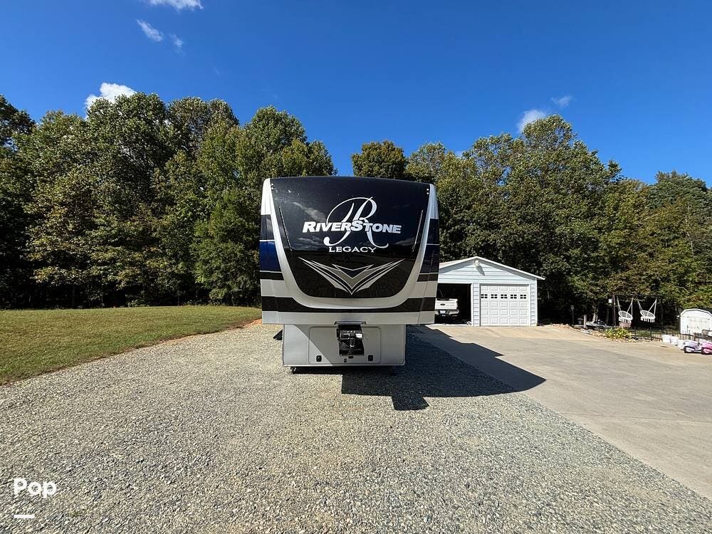 Contact us now about this 2021 Forest River RiverStone 39RKFB! 2021 RiverStone 39RKFB by Forest River from Pop RVs in Climax, North Carolina