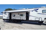 Call now about this 2024 Forest River Rogue 23SUT! 2024 Forest River Rogue 23SUT - Used Fifth Wheel For Sale by Pop RVs in Stuart, Florida features Generator, Air Conditioning, Awning