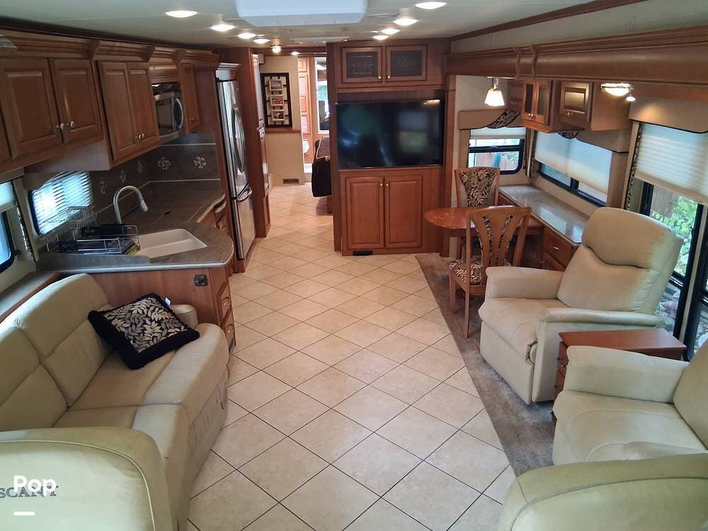 Call now about this 2010 Damon Tuscany 42RQ! 2010 Damon Tuscany 42RQ - Used Diesel Pusher For Sale by Pop RVs in Lake, Michigan features Slideout, Air Conditioning, Awning, Leveling Jacks, Generator