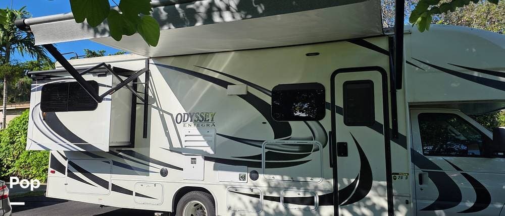Call now about this 2021 Entegra Coach Odyssey 26D! 2021 Entegra Coach Odyssey 26D - Used Class C For Sale by Pop RVs in South Miami, Florida features Slideout, Generator, Air Conditioning, Leveling Jacks