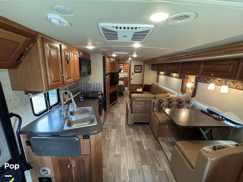Call now about this 2018 Winnebago Sunstar LX 35F! 2018 Winnebago Sunstar LX 35F - Used Class A For Sale by Pop RVs in Owens Cross Roads, Alabama features Generator, Awning, Leveling Jacks, Slideout, Air Conditioning