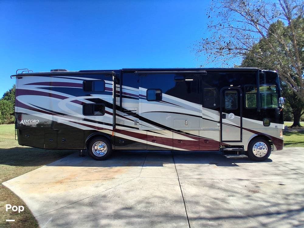Call now about this 2013 Tiffin Allegro 35QBA! 2013 Tiffin Allegro 35QBA - Used Class A For Sale by Pop RVs in Lillington, North Carolina features Slideout, Air Conditioning, Awning, Leveling Jacks, Generator