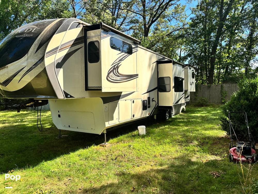 Call now about this 2020 Grand Design Solitude 390RK! 2020 Grand Design Solitude 390RK - Used Fifth Wheel For Sale by Pop RVs in Beverly, Massachusetts features Slideout, Air Conditioning, Awning, Leveling Jacks