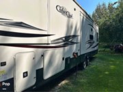 Call now about this 2021 Forest River Cedar Creek 36CK2! 2021 Forest River Cedar Creek 36CK2 - Used Fifth Wheel For Sale by Pop RVs in Germfask, Michigan features Slideout, Leveling Jacks, Awning, Air Conditioning
