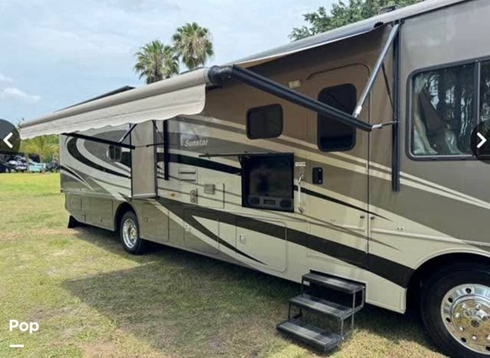 Call now about this 2014 Itasca Sunstar 35B! 2014 Itasca Sunstar 35B - Used Class A For Sale by Pop RVs in North Platte, Nebraska features Air Conditioning, Awning, Generator, Slideout