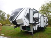 Call now about this 2022 Grand Design Momentum 381M-R! 2022 Grand Design Momentum 381M-R - Used Toy Hauler For Sale by Pop RVs in Richmond, New Hampshire features Awning, Generator, Slideout, Air Conditioning, Leveling Jacks