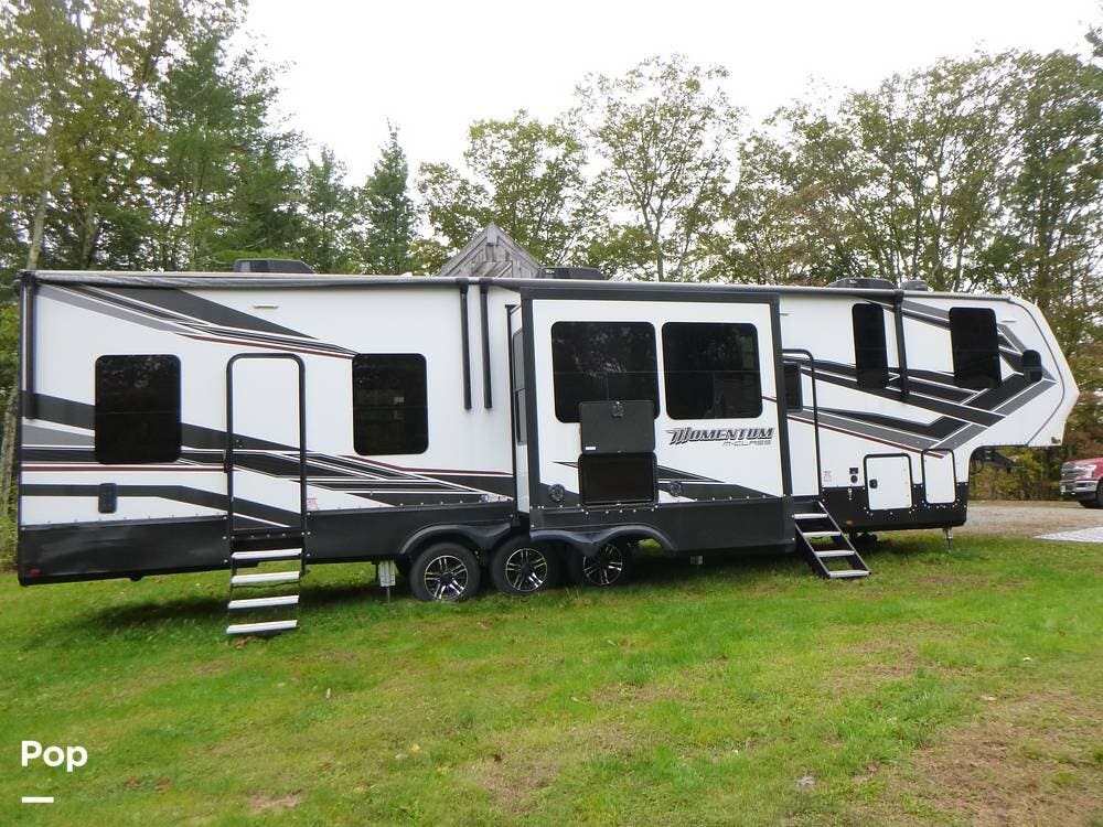 Contact us now about this 2022 Grand Design Momentum 381M-R! 2022 Momentum 381M-R by Grand Design from Pop RVs in Richmond, New Hampshire