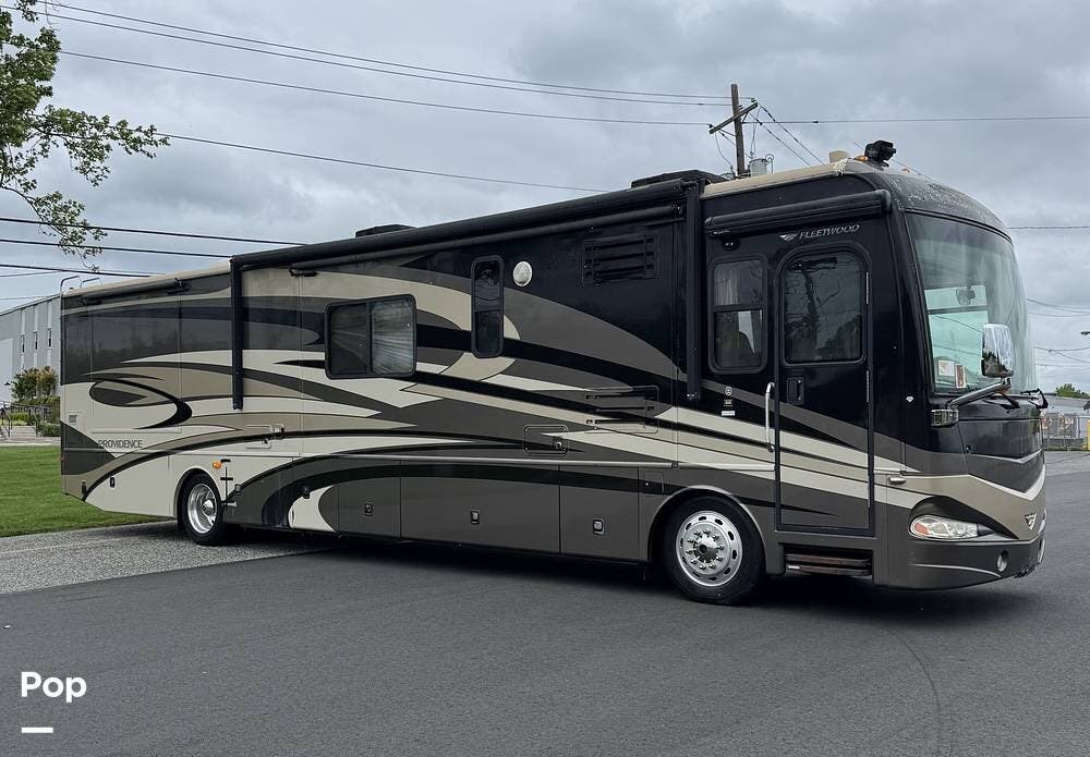 Call now about this 2008 Fleetwood Providence 40X! 2008 Fleetwood Providence 40X - Used Diesel Pusher For Sale by Pop RVs in East Brunswick, New Jersey features Generator, Slideout, Leveling Jacks, Air Conditioning, Awning