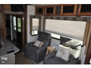 Call now about this 2016 Keystone Carbon 327! 2016 Keystone Carbon 327 - Used Toy Hauler For Sale by Pop RVs in Lake Havasu City, Arizona features Air Conditioning, Leveling Jacks, Generator, Awning, Slideout