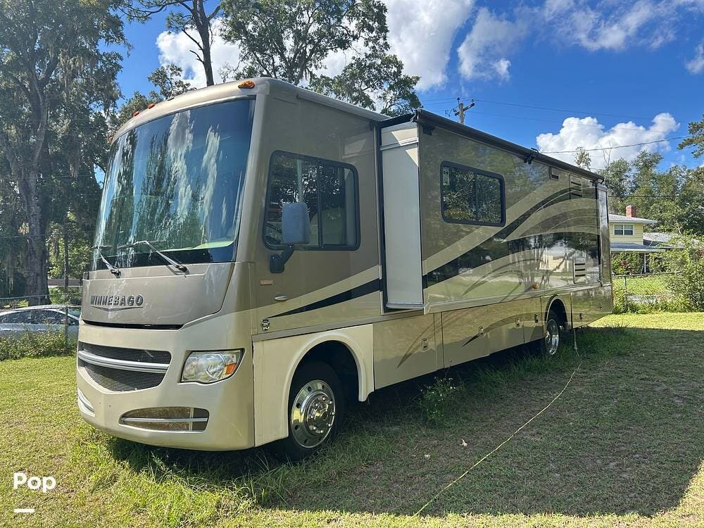 Call now about this 2013 Winnebago Sightseer 33C! 2013 Winnebago Sightseer 33C - Used Class A For Sale by Pop RVs in Ocala, Florida features Air Conditioning, Slideout, Generator, Awning