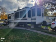 Call now about this 2023 Forest River Cedar Creek 40CBAR! 2023 Forest River Cedar Creek 40CBAR - Used Park Model For Sale by Pop RVs in Lake Geneva, Wisconsin features Air Conditioning, Awning, Slideout