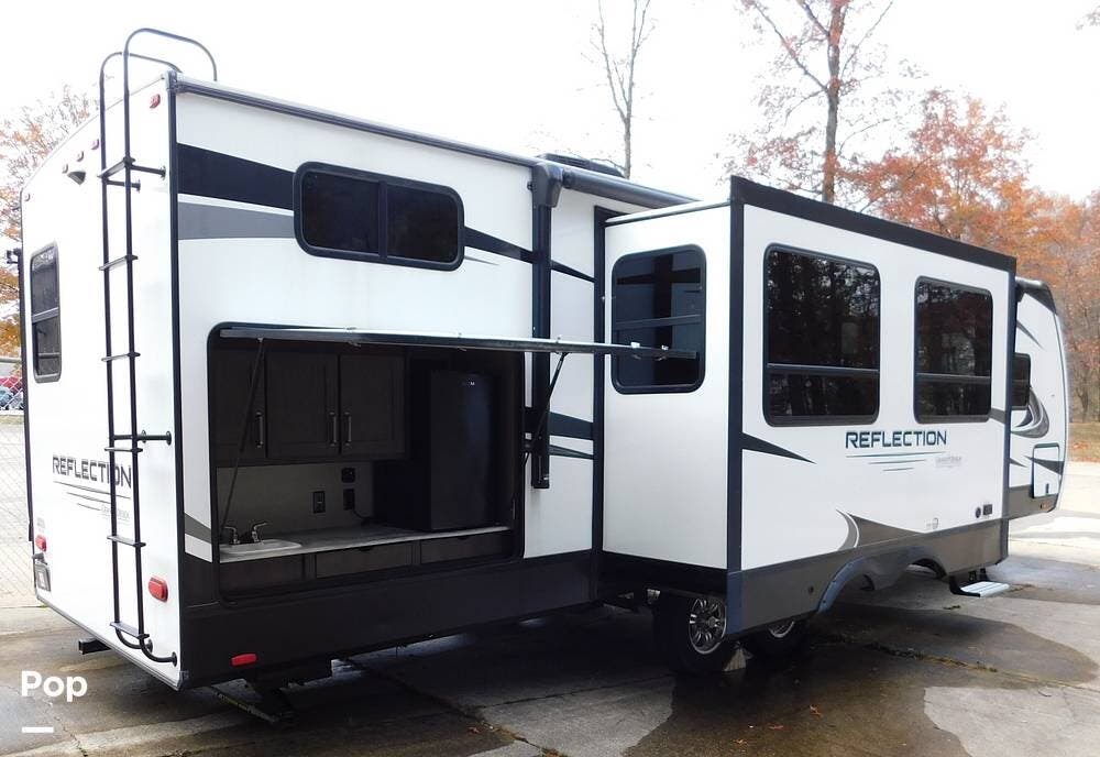 Call now about this 2021 Grand Design Reflection 312BHTS! 2021 Grand Design Reflection 312BHTS - Used Travel Trailer For Sale by Pop RVs in Parma, Ohio features Air Conditioning, Slideout, Leveling Jacks, Awning