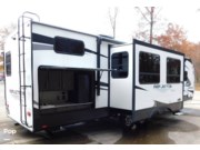 Call now about this 2021 Grand Design Reflection 312BHTS! 2021 Grand Design Reflection 312BHTS - Used Travel Trailer For Sale by Pop RVs in Parma, Ohio features Air Conditioning, Slideout, Leveling Jacks, Awning