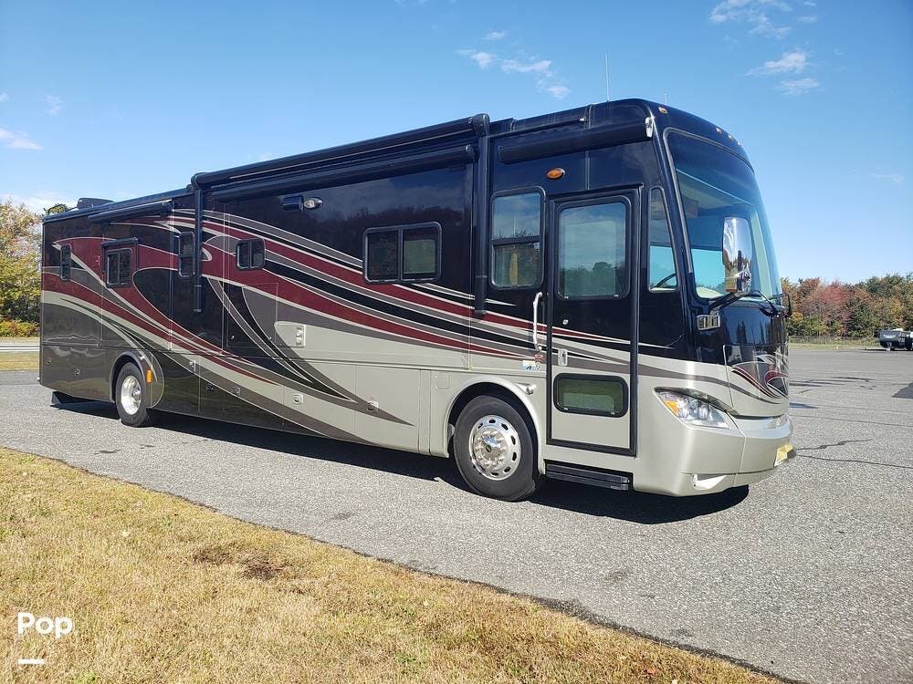 Call now about this 2013 Tiffin Phaeton 40QBH! 2013 Tiffin Phaeton 40QBH - Used Diesel Pusher For Sale by Pop RVs in Berlin, New Jersey features Generator, Awning, Air Conditioning, Leveling Jacks, Slideout
