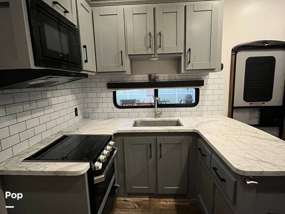 Call now about this 2020 Keystone Impact 359! 2020 Keystone Impact 359 - Used Toy Hauler For Sale by Pop RVs in Wappingers Falls, New York features Air Conditioning, Awning, Slideout, Generator, Leveling Jacks