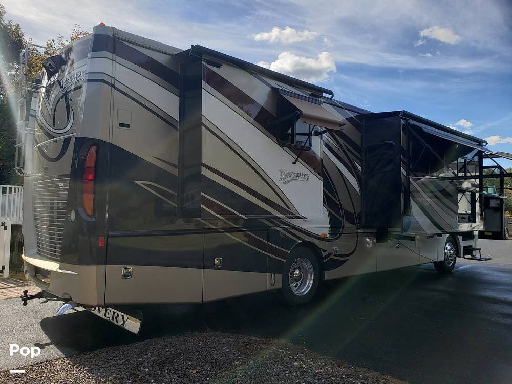 Call now about this 2013 Fleetwood Discovery 36J! 2013 Fleetwood Discovery 36J - Used Diesel Pusher For Sale by Pop RVs in Millville, New Jersey features Generator, Air Conditioning, Awning, Leveling Jacks, Slideout