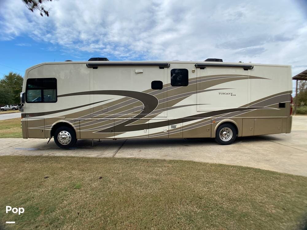 Call now about this 2014 Thor Motor Coach Tuscany XTE 40EX! 2014 Thor Motor Coach Tuscany XTE 40EX - Used Diesel Pusher For Sale by Pop RVs in Ellerslie, Georgia features Generator, Awning, Slideout, Air Conditioning