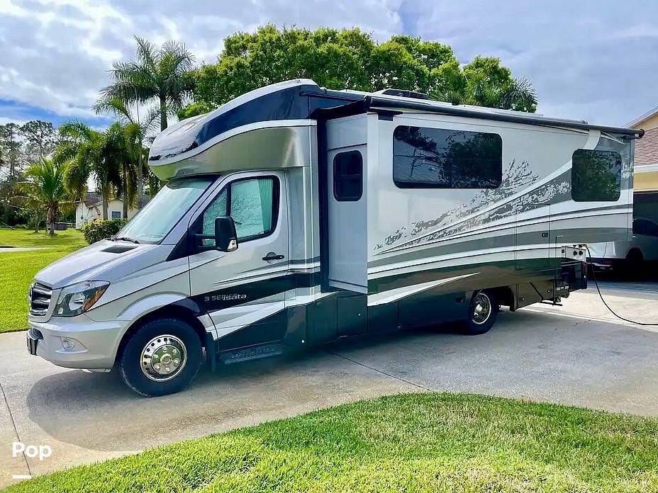 Call now about this 2019 Dynamax Corp Isata 3 24FW! 2019 Dynamax Corp Isata 3 24FW - Used Class C For Sale by Pop RVs in Vero Beach, Florida features Air Conditioning, Generator, Leveling Jacks, Awning, Slideout