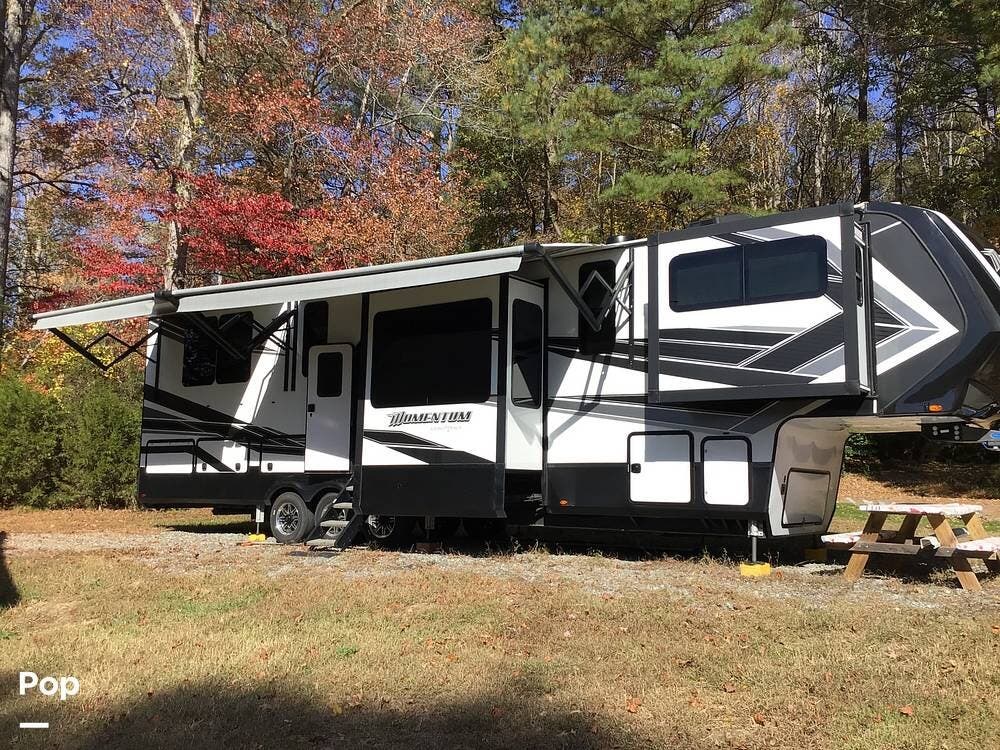 Call now about this 2021 Grand Design Momentum 376TH! 2021 Grand Design Momentum 376TH - Used Toy Hauler For Sale by Pop RVs in Lancaster, Virginia features Leveling Jacks, Generator, Awning, Slideout, Air Conditioning