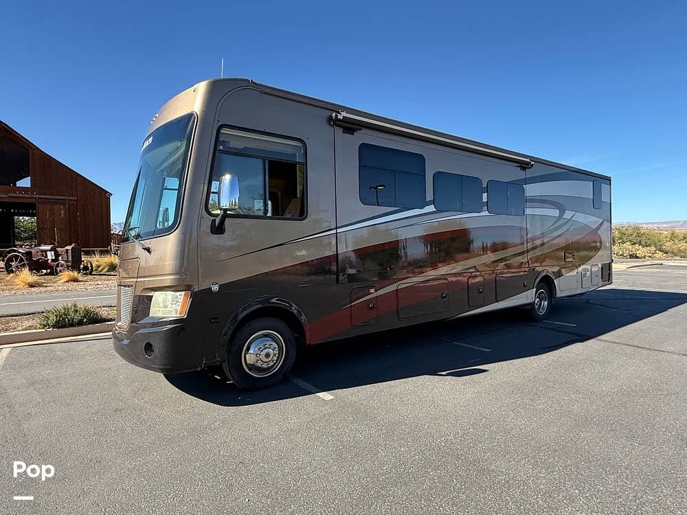 Call now about this 2015 Coachmen Mirada 35LS! 2015 Coachmen Mirada 35LS - Used Class A For Sale by Pop RVs in Saint George, Utah features Air Conditioning, Leveling Jacks, Awning, Generator, Slideout