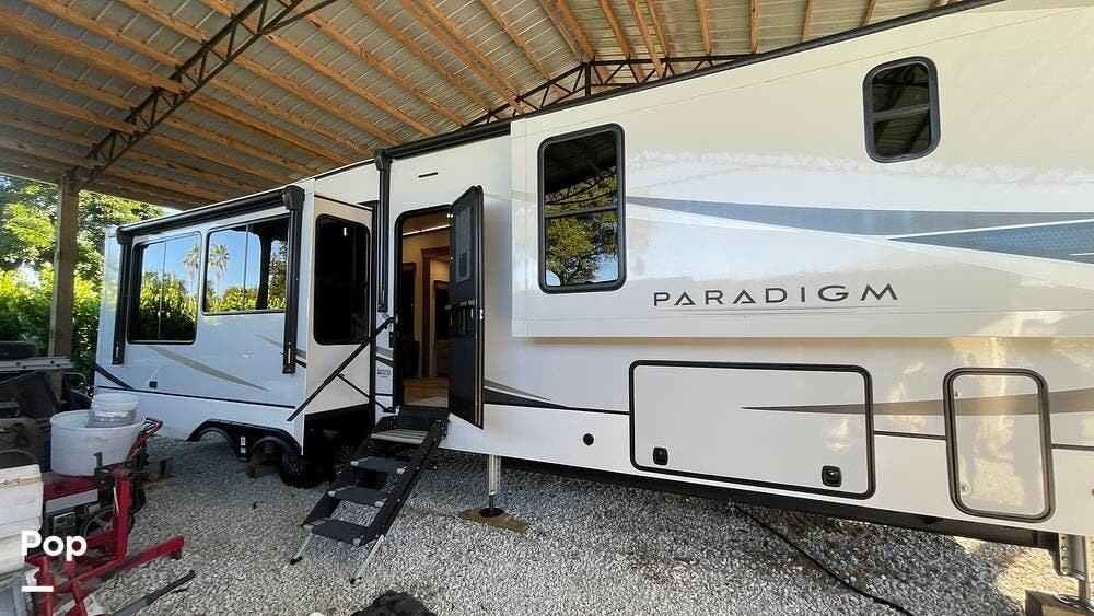 Call now about this 2024 Alliance RV Paradigm 382RK! 2024 Alliance RV Paradigm 382RK - Used Fifth Wheel For Sale by Pop RVs in North Fort Myers, Florida features Leveling Jacks, Slideout, Air Conditioning, Awning