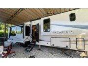 Call now about this 2024 Alliance RV Paradigm 382RK! 2024 Alliance RV Paradigm 382RK - Used Fifth Wheel For Sale by Pop RVs in North Fort Myers, Florida features Leveling Jacks, Slideout, Air Conditioning, Awning