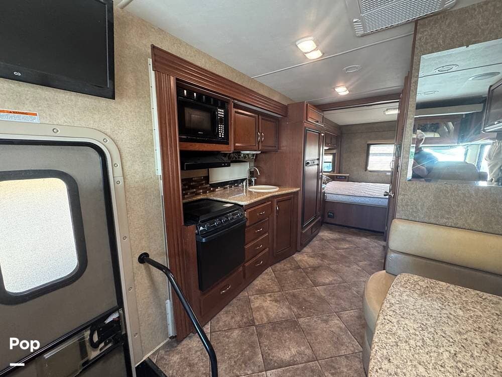 Call now about this 2014 Thor Motor Coach A.C.E. 27.1! 2014 Thor Motor Coach A.C.E. 27.1 - Used Class A For Sale by Pop RVs in Gold Canyon, Arizona features Awning, Leveling Jacks, Air Conditioning, Generator, Slideout
