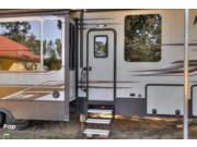 Call now about this 2018 Keystone Raptor 355TS! 2018 Keystone Raptor 355TS - Used Toy Hauler For Sale by Pop RVs in Williston, South Carolina features Generator, Awning, Leveling Jacks, Slideout, Air Conditioning