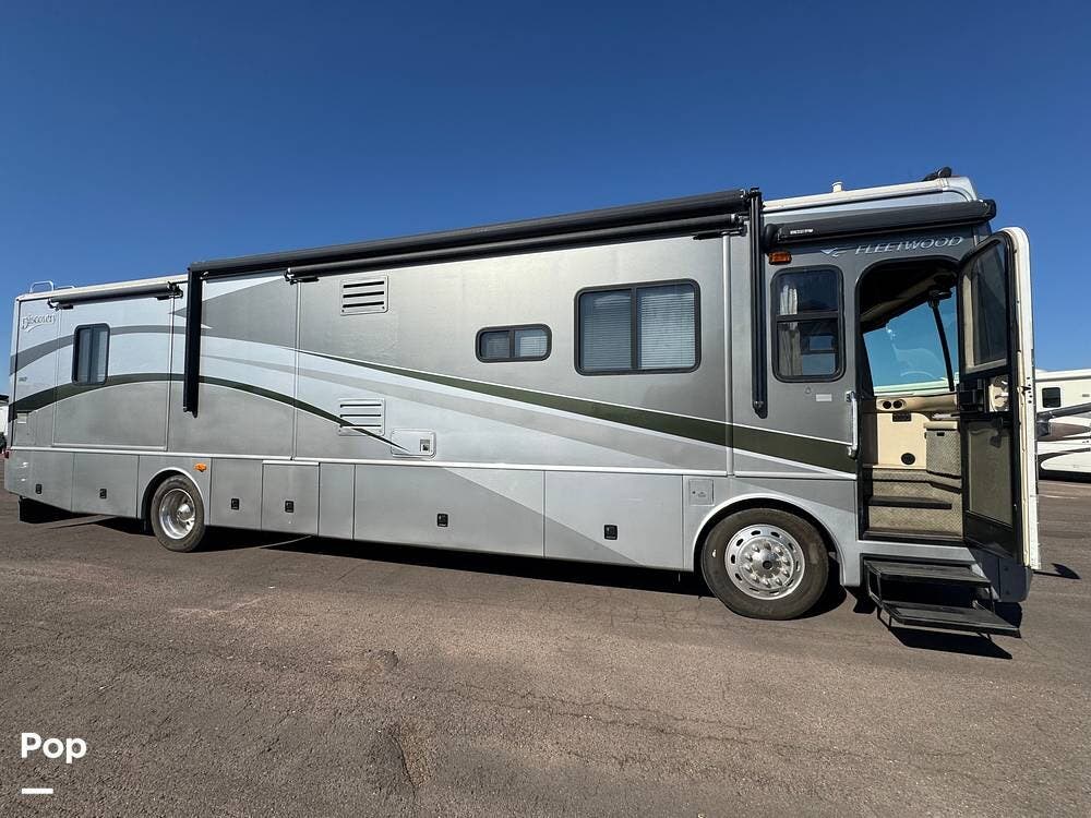 Call now about this 2006 Fleetwood Discovery 39L! 2006 Fleetwood Discovery 39L - Used Diesel Pusher For Sale by Pop RVs in Surprise, Arizona features Air Conditioning, Generator, Slideout, Awning