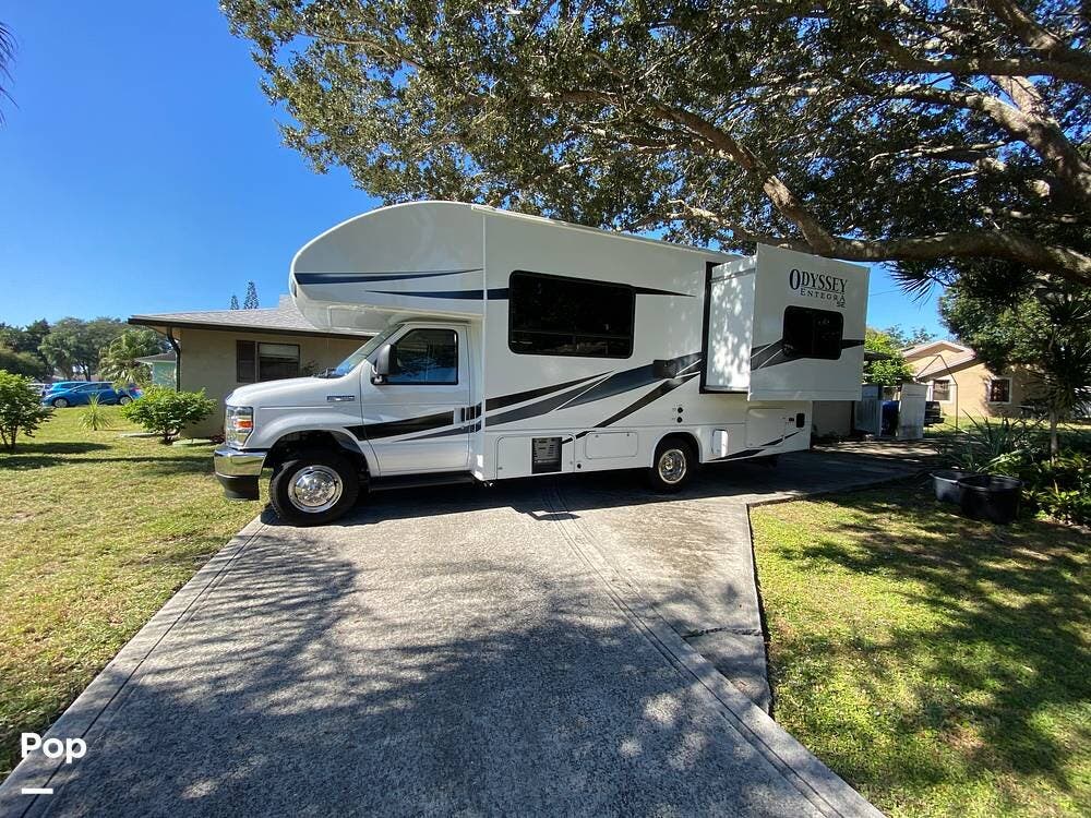 Call now about this 2025 Entegra Coach Odyssey SE 22CF! 2025 Entegra Coach Odyssey SE 22CF - Used Class C For Sale by Pop RVs in Port Saint Lucie, Florida features Air Conditioning, Slideout, Generator