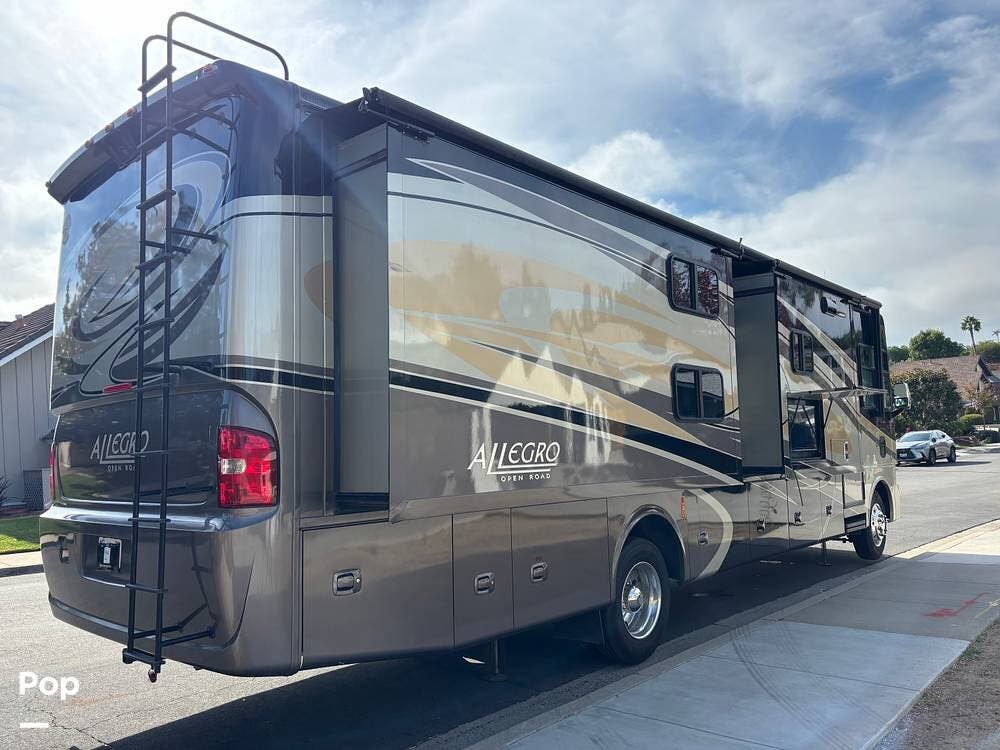 Call now about this 2015 Tiffin Allegro Open Road 35QBA! 2015 Tiffin Allegro Open Road 35QBA - Used Class A For Sale by Pop RVs in Carlsbad, California features Slideout, Air Conditioning, Awning, Generator, Leveling Jacks