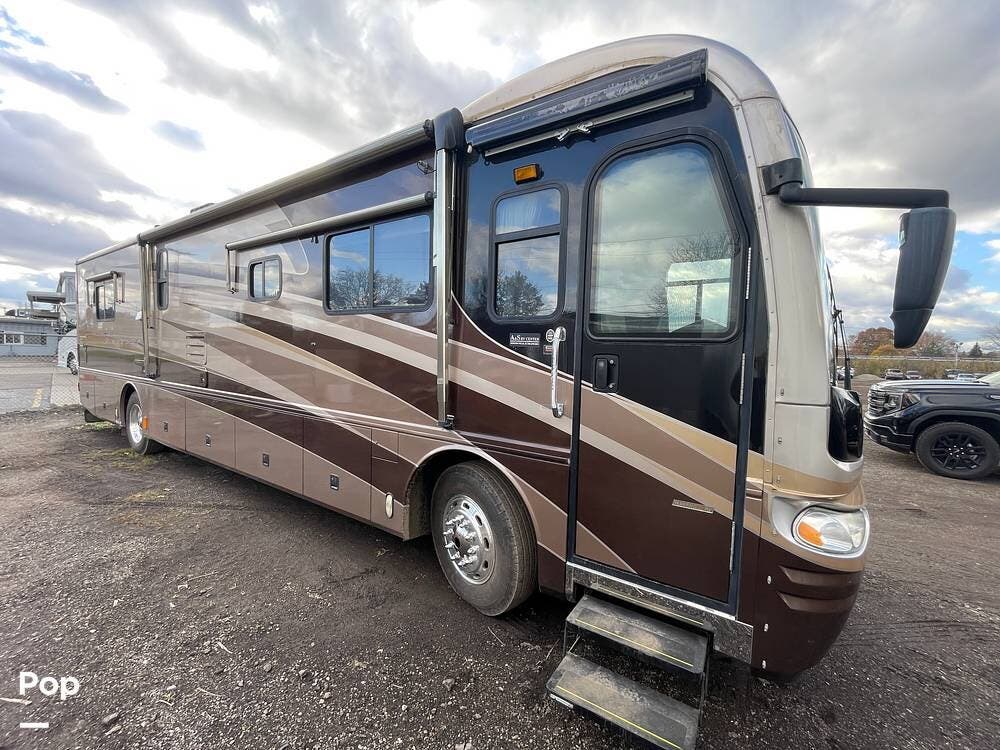 Call now about this 2004 Fleetwood Revolution 38B! 2004 Fleetwood Revolution 38B - Used Diesel Pusher For Sale by Pop RVs in Troy, Michigan features Leveling Jacks, Generator, Slideout, Awning, Air Conditioning