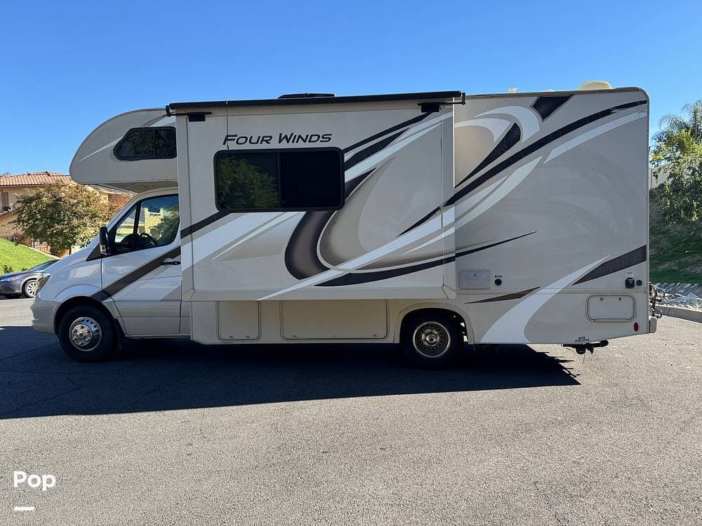 Call now about this 2019 Thor Motor Coach Four Winds 24WS! 2019 Thor Motor Coach Four Winds 24WS - Used Class C For Sale by Pop RVs in Upland, California features Slideout, Air Conditioning, Generator, Awning