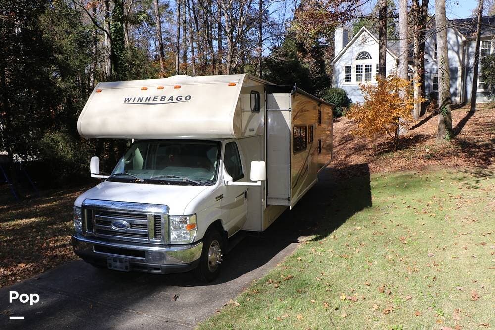 Call now about this 2016 Winnebago Minnie Winnie 31G! 2016 Winnebago Minnie Winnie 31G - Used Class C For Sale by Pop RVs in Woodstock, Georgia features Air Conditioning, Generator, Awning, Slideout