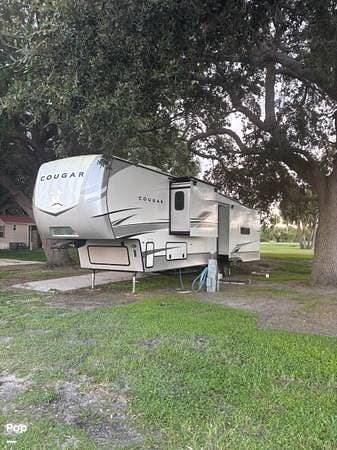 Call now about this 2023 Keystone Cougar 355 FBS! 2023 Keystone Cougar 355 FBS - Used Fifth Wheel For Sale by Pop RVs in Moore Haven, Florida features Slideout