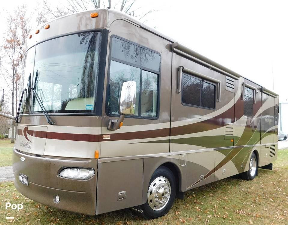 Call now about this 2006 Itasca Meridian 32T! 2006 Itasca Meridian 32T - Used Diesel Pusher For Sale by Pop RVs in North Ridgeville, Ohio features Generator, Air Conditioning, Leveling Jacks, Awning, Slideout