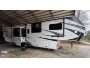 Call now about this 2024 Grand Design Solitude 390RK! 2024 Grand Design Solitude 390RK - Used Fifth Wheel For Sale by Pop RVs in Fort Payne, Alabama features Slideout, Air Conditioning, Awning, Leveling Jacks
