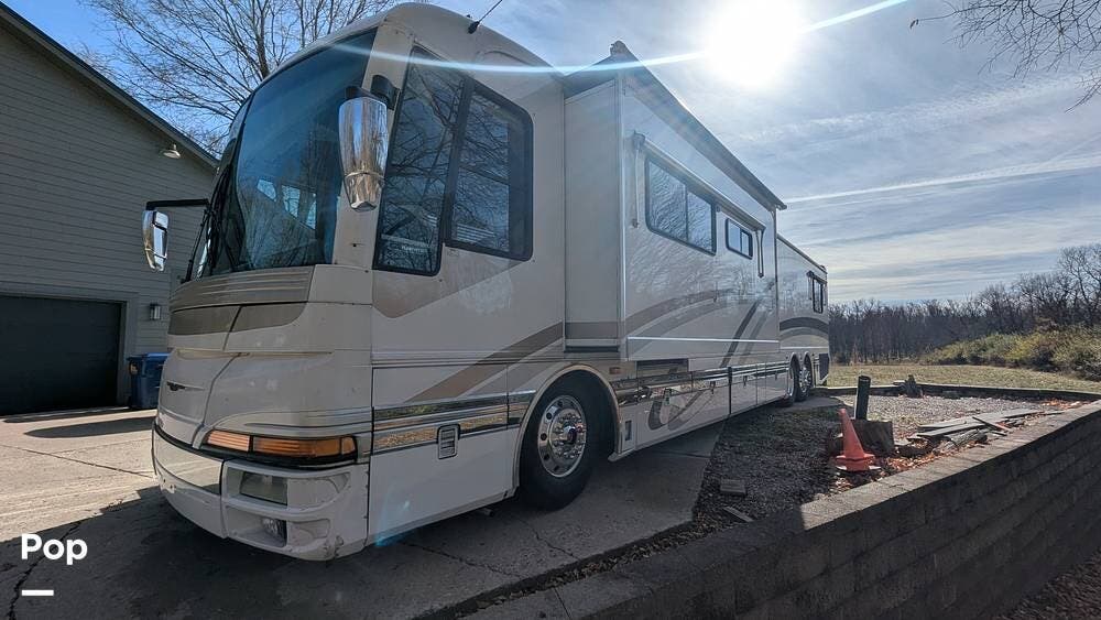 Call now about this 2000 American Coach American Heritage 45IS! 2000 American Coach American Heritage 45IS - Used Diesel Pusher For Sale by Pop RVs in Brownsburg, Indiana features Air Conditioning, Generator, Slideout, Leveling Jacks, Awning