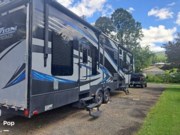 Call now about this 2015 Keystone Fuzion Chrome FZ345! 2015 Keystone Fuzion Chrome FZ345 - Used Toy Hauler For Sale by Pop RVs in Mountain City, Tennessee features Air Conditioning, Slideout, Generator, Awning, Leveling Jacks